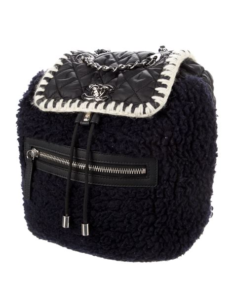 coco chanel neige plush black back pack|Chanel 22 backpack.